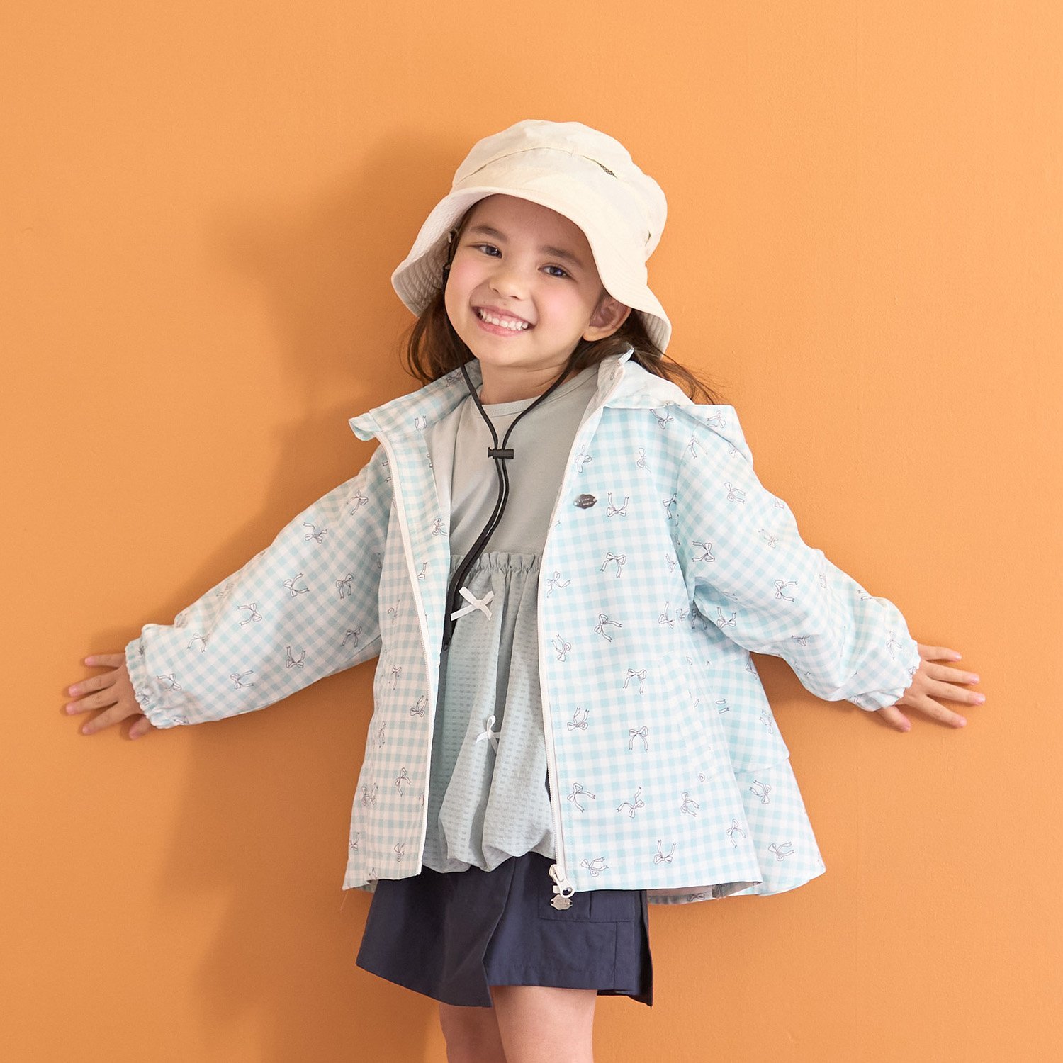 【スクール対応】【撥水・防汚・耐久・UV】収納袋付きバックフリルAラインマウンテンパーカー