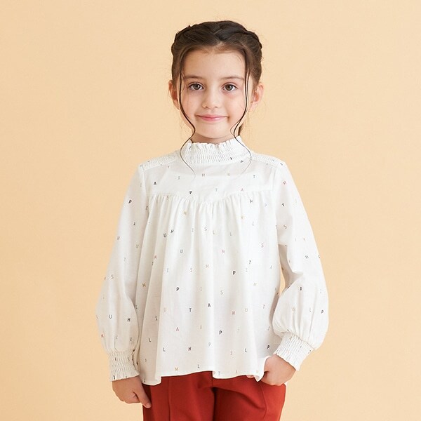アルファベットシャーリングブラウス