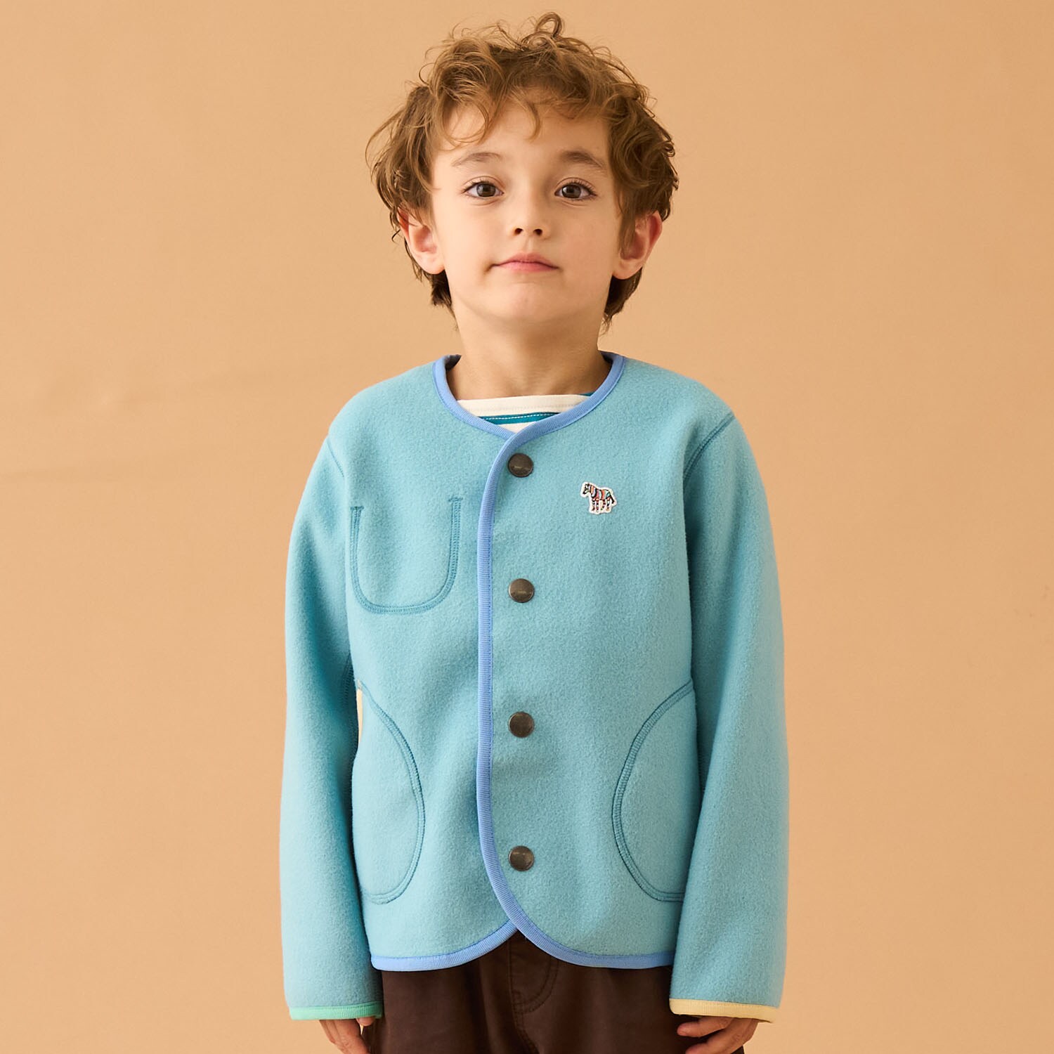 配色パイピングノーカラージャケット