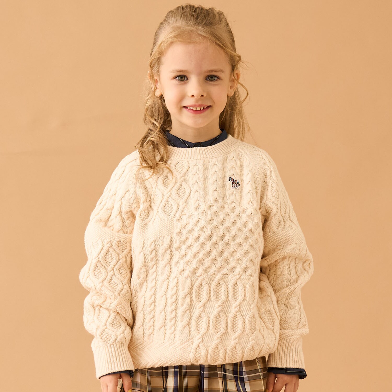 ケーブル編みセーター