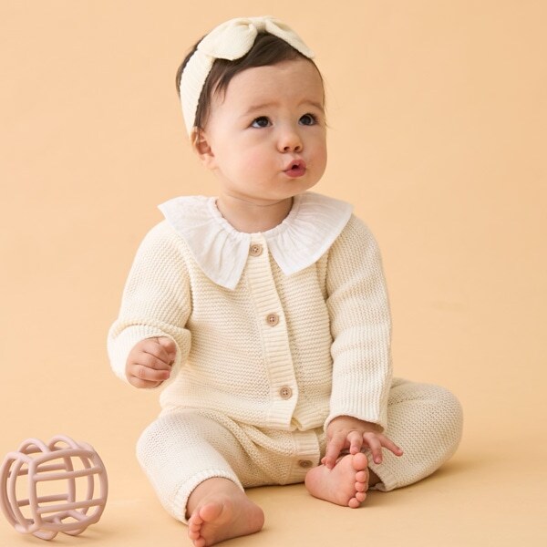 フリル衿つきニットカバーオール