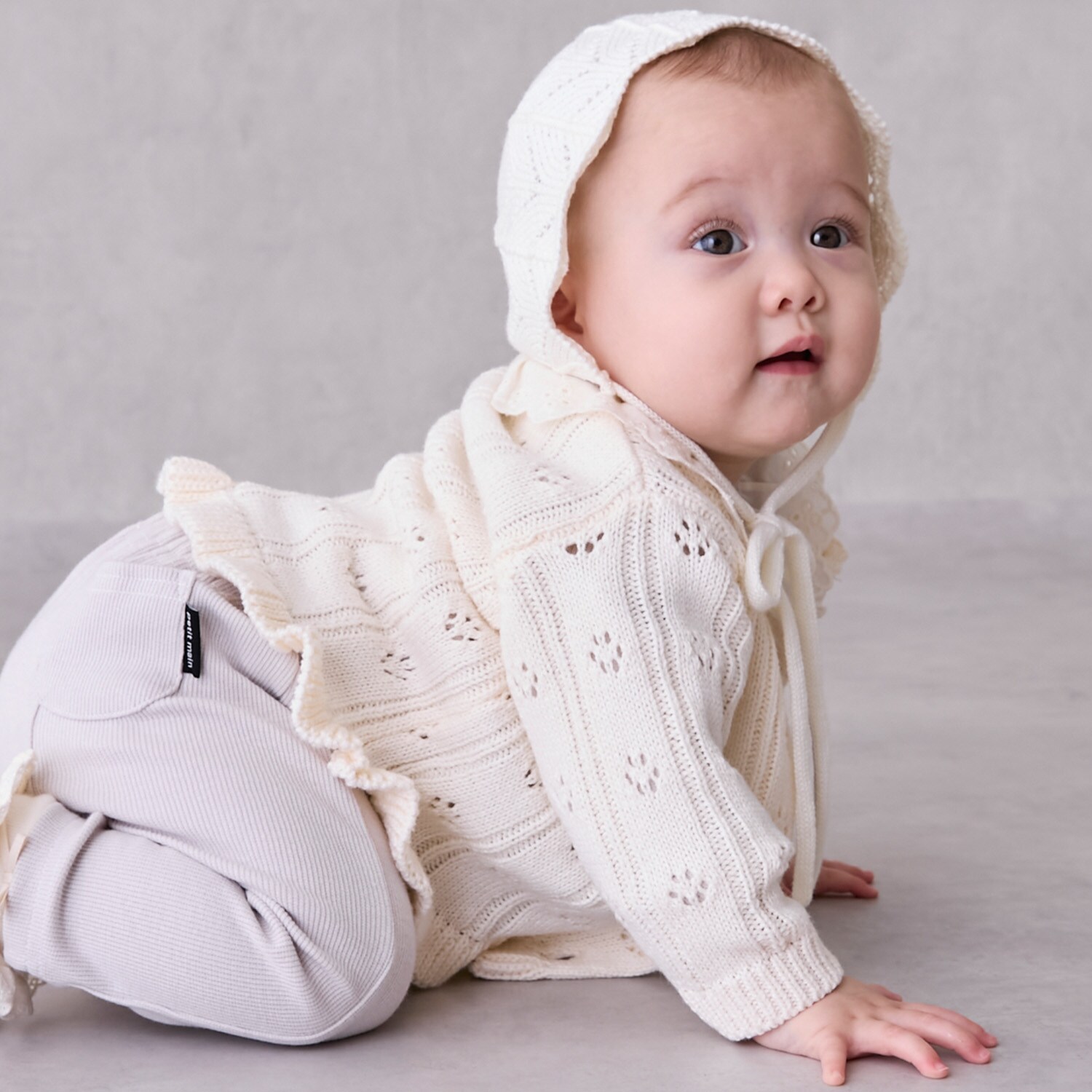 裾フリル針抜きカーディガン