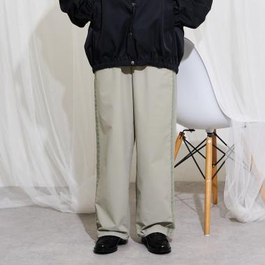 【AMI】機能素材サイドラインパンツ