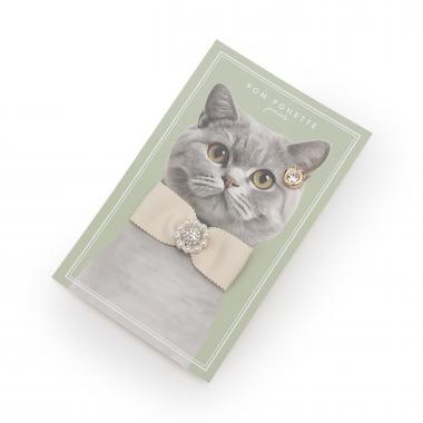 ビジューリボンブローチ